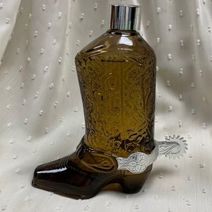 Avon Wild Country after shave bottle (mostly full). Cowboy boot shaped.